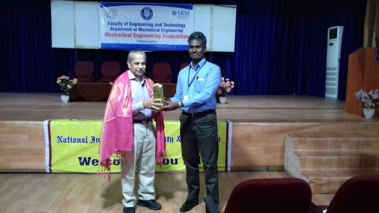 Felicitating the faculty Mr. C V Gowri Sankar